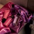 Assorted anal lubricants on velvet cloth